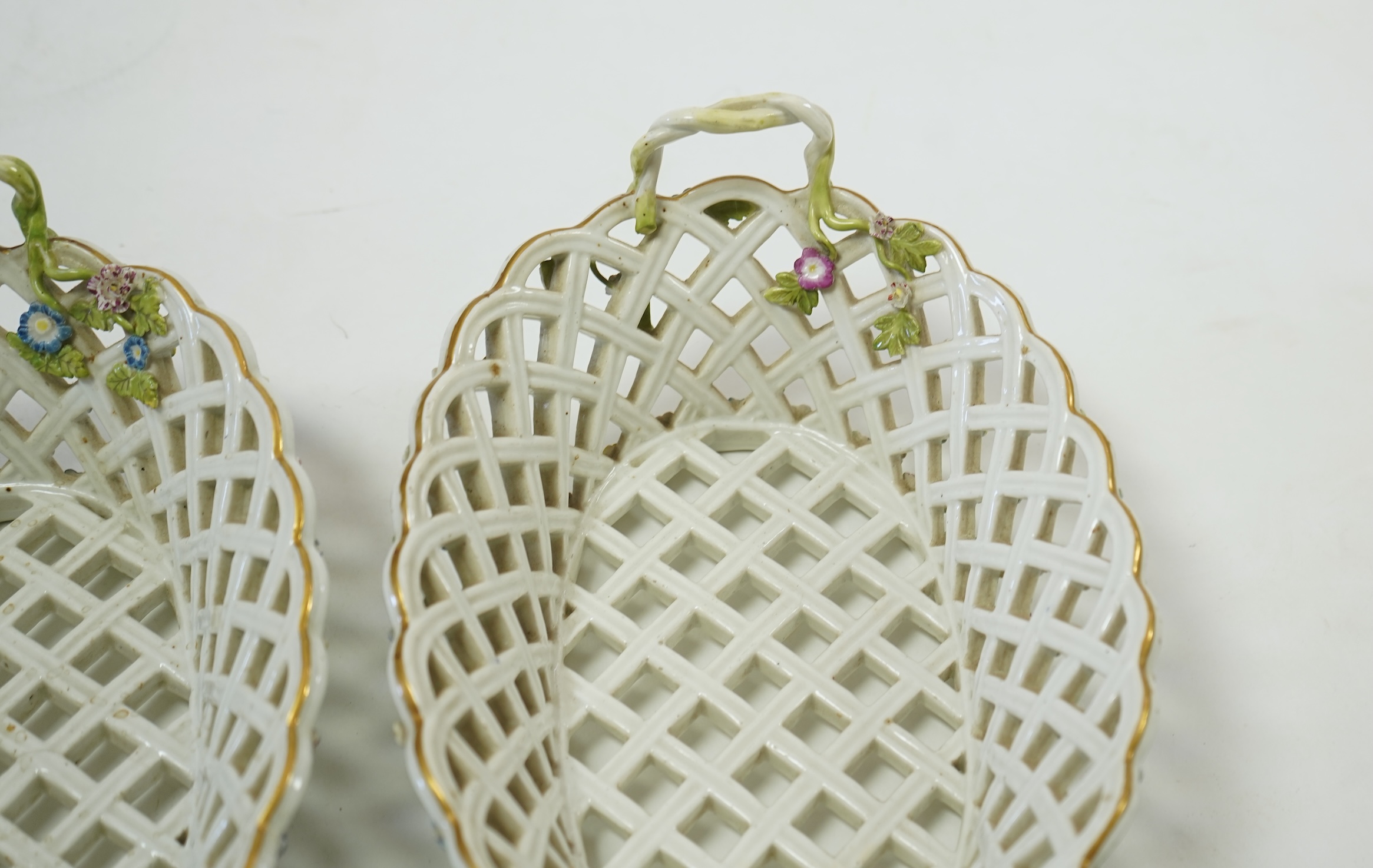 A pair of mid 18th century Meissen porcelain reticulated baskets c.1765